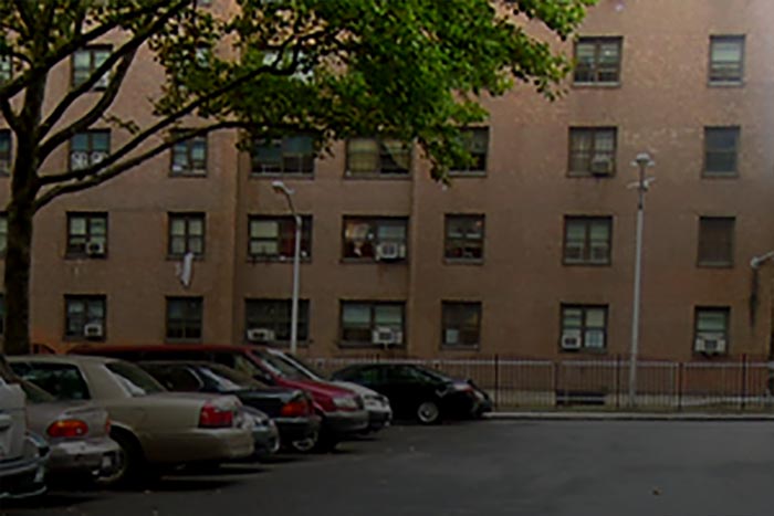 Cars parked in front of a building